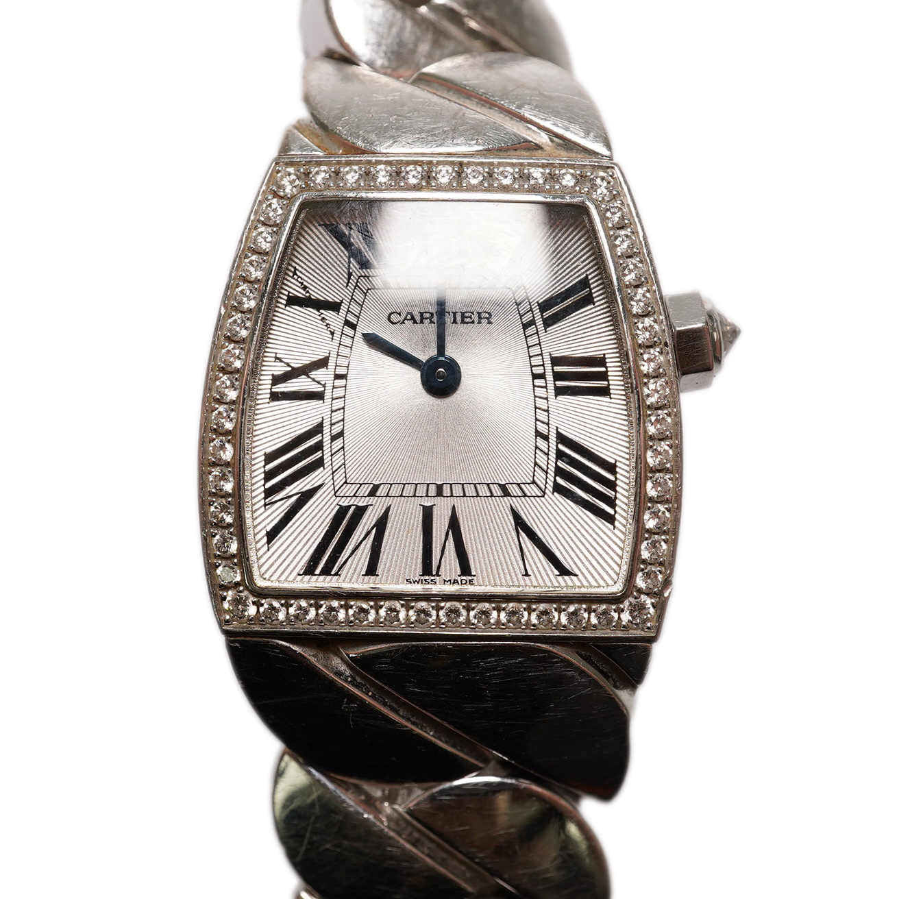 A lady's recent 18ct white gold and diamond set Cartier La Dona quartz wrist watch, on an 18ct white gold Cartier bracelet